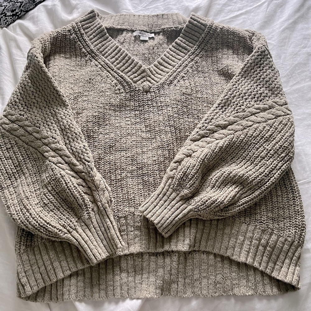 Thick and will keep you warm!! Goes with about everything!!